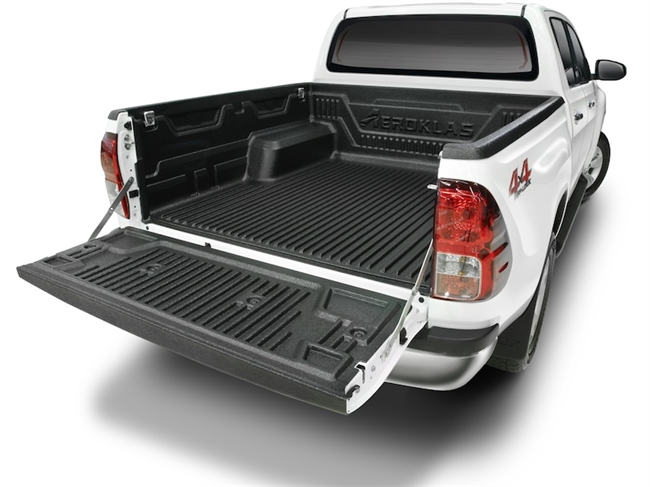 Ladindsats/bedliner - Over rail fra Aeroklas Kompatibel med originale lastkroge til Toyota Hilux Double Cab Årgang 2015-